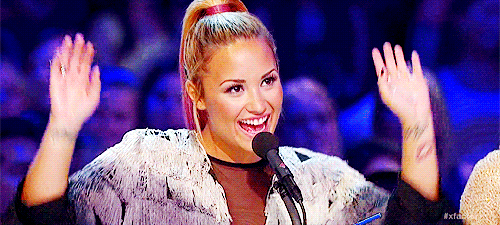 demi-lovato-arms-up-yeah-gif